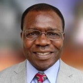 a smiling picture of Elias Kifon Bongmba