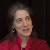 a casual photo of Anne Klein, appearing as though in conversation